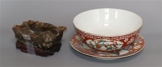 A Chinese porcelain bowl, decorated with figures in reserves on an iron red ground and two other items,